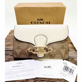 コーチ(COACH)の新品　COACH コーチ　馬車金具　二つ折り財布　シグネチャー　エンべローブ(財布)