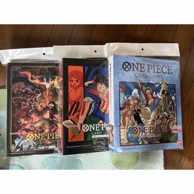 ONE PIECE(ワンピース)の【新品+おまけ付き】ワンピースカードゲーム　バインダー3種セット エンタメ/ホビーのトレーディングカード(カードサプライ/アクセサリ)の商品写真