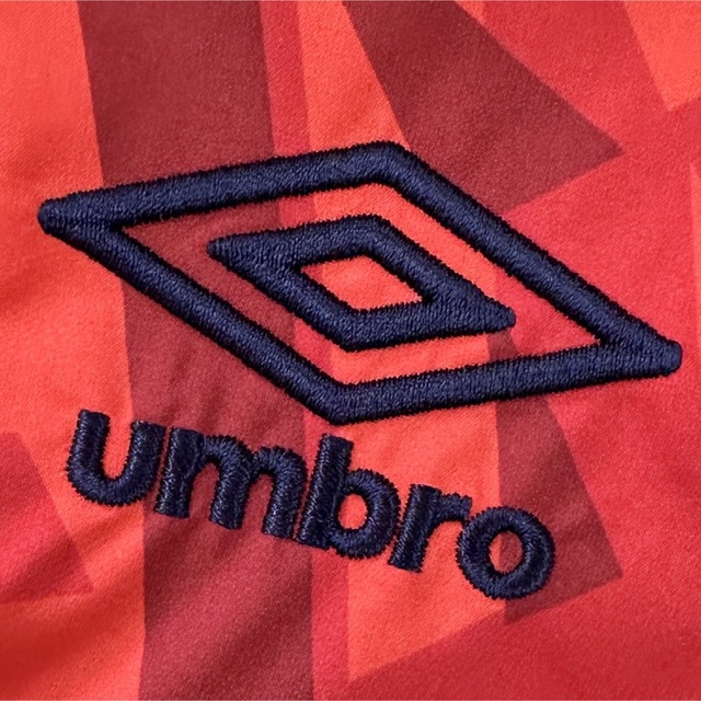 UMBRO(アンブロ)のUMBRO アンブロ ハーフジップ ウィンドブレーカー 総柄 防風 刺繍ロゴ メンズのジャケット/アウター(ナイロンジャケット)の商品写真