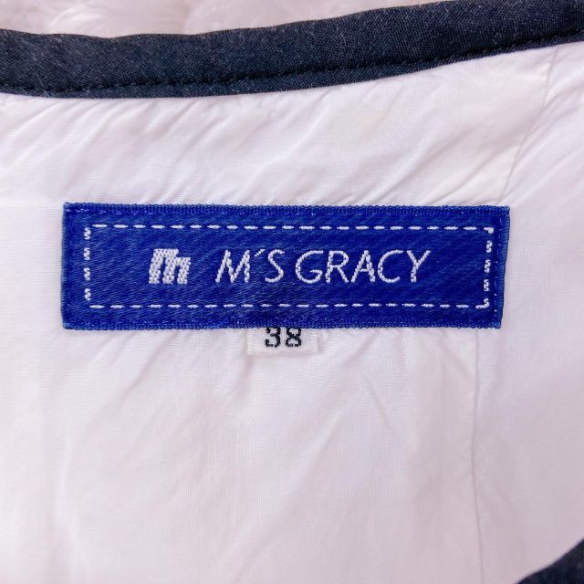 M'S GRACY(エムズグレイシー)の専用 エムズグレイシー リボン 花柄 総柄 M 膝丈ワンピース フレア 白 紺 レディースのワンピース(ひざ丈ワンピース)の商品写真