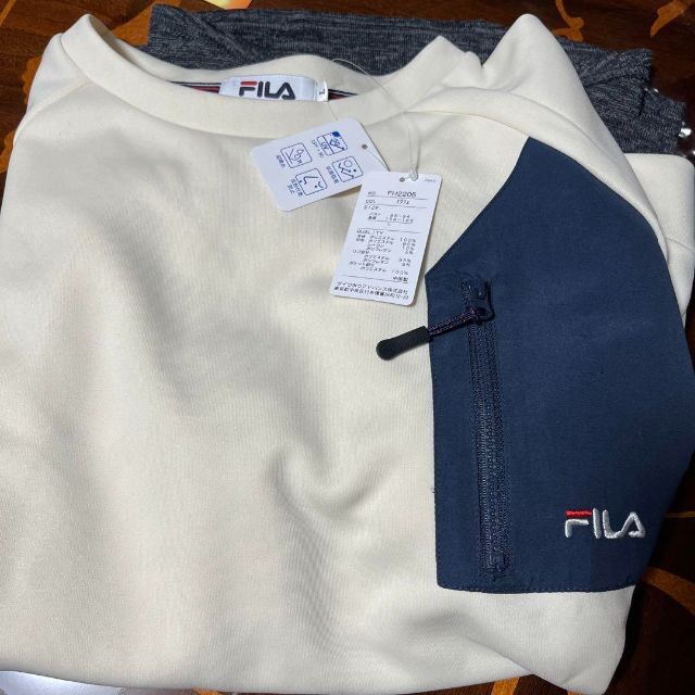 FILA(フィラ)の★FILA ポケット付きトレーナー　チュニック風　L レディースのトップス(チュニック)の商品写真