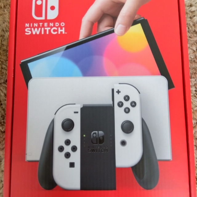 Nintendo Switch(ニンテンドースイッチ)のNintendo Switch(有機ＥＬモデル)本体 ホワイト エンタメ/ホビーのゲームソフト/ゲーム機本体(携帯用ゲーム機本体)の商品写真