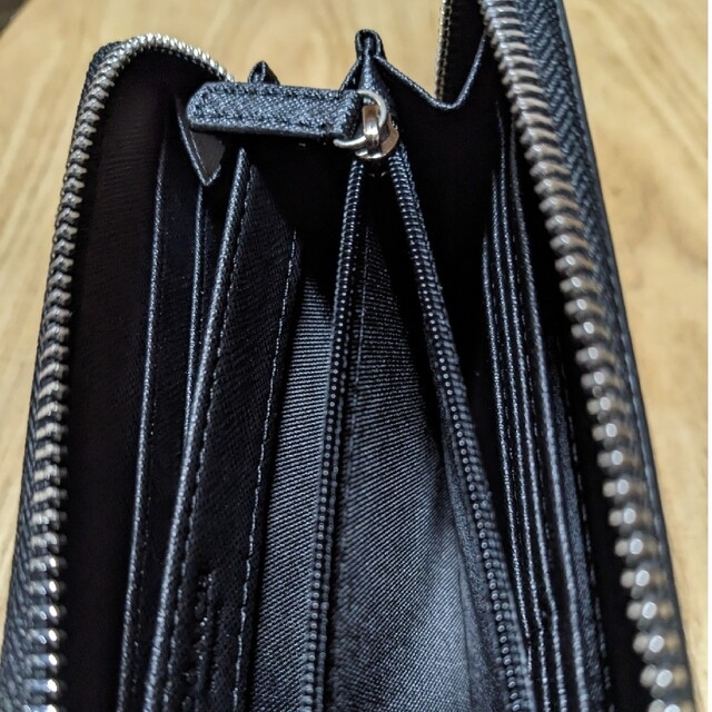 COACH(コーチ)のCOACH  長財布　ラウンドファスナー　スヌーピー黒 レディースのファッション小物(財布)の商品写真