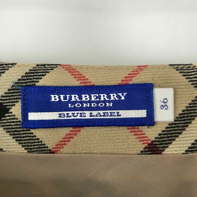 BURBERRY BLUE LABEL(バーバリーブルーレーベル)のBURBERRY バーバリーブルーレーベル ノバチェック　台形スカート ベルト付 レディースのスカート(ひざ丈スカート)の商品写真