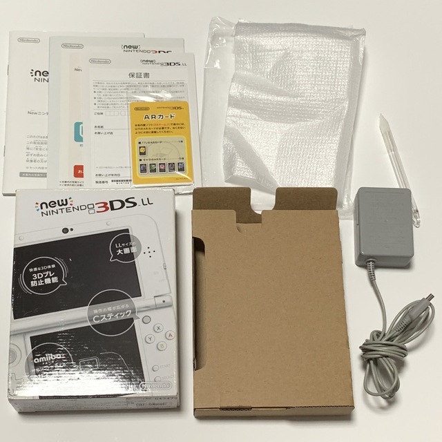 Newニンテンドー3DS LL パールホワイト 本体 ACアダプター エンタメ/ホビーのゲームソフト/ゲーム機本体(携帯用ゲーム機本体)の商品写真