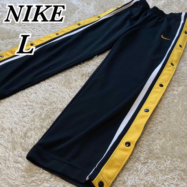 NIKE 刺繍ロゴ ゆるだぼ サイドライン スナップボタン トラックパンツ