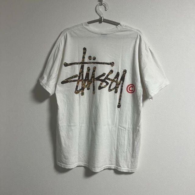 STUSSY(ステューシー)の【迷彩ロゴ】Stussy Tシャツ 半袖 カモフラ 迷彩 バックプリント メンズのトップス(Tシャツ/カットソー(半袖/袖なし))の商品写真