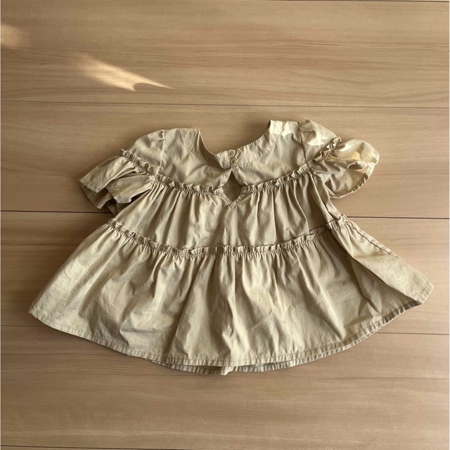 babyGAP(ベビーギャップ)のGAPティアードブラウスTシャツ キッズ/ベビー/マタニティのベビー服(~85cm)(シャツ/カットソー)の商品写真