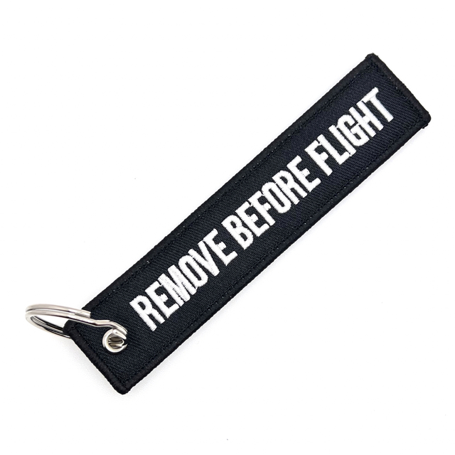 『REMOVE BEFORE FLIGHT』ブラック　フライトタグ キーリング エンタメ/ホビーのテーブルゲーム/ホビー(航空機)の商品写真