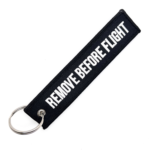 『REMOVE BEFORE FLIGHT』ブラック　フライトタグ キーリング エンタメ/ホビーのテーブルゲーム/ホビー(航空機)の商品写真