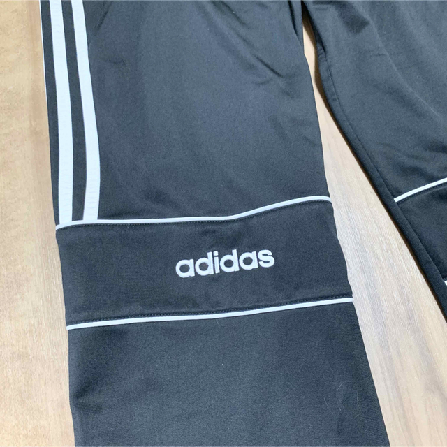 adidas(アディダス)の90s adidas トラックパンツ メンズM 黒 万国旗タグ トレフォイルロゴ メンズのパンツ(その他)の商品写真