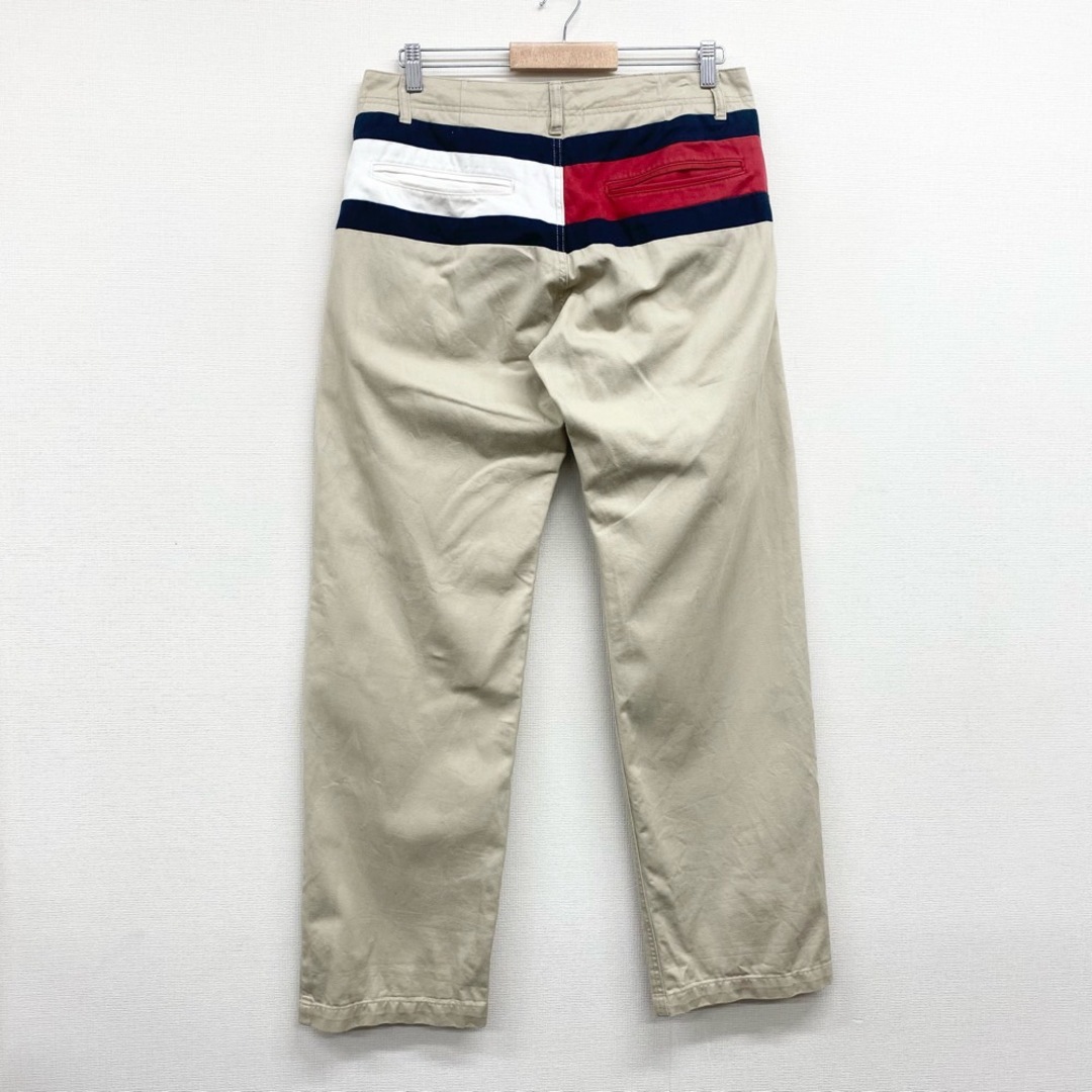 US古着 トミーヒルフィガー TOMMY HILFIGER チノパンツ ロゴ サイズ：W34 L32.5 ベージュ 【中古】