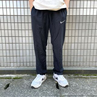 ナイキ(NIKE)のUS古着 ナイキ NIKE トラックパンツ スウッシュロゴ 刺繍 DRI-FIT サイズ：レディース L メンズ S相当 W28～ L29 ブラック 【中古】(スラックス/スーツパンツ)