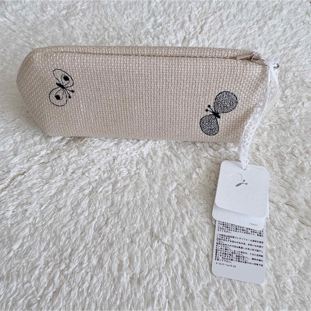 mina perhonen(ミナペルホネン)の《完売品》ミナ ペルホネンchoucho quartz pouch＊新品未使用 レディースのファッション小物(ポーチ)の商品写真