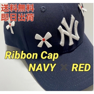 ワンエルディーケーセレクト(1LDK SELECT)のNick Gear Flower Ribbon Cap Navy × Red(キャップ)