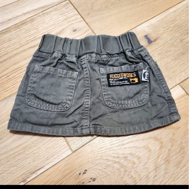 RUGGEDWORKS(ラゲッドワークス)のRUGGEDWORKS ラゲッドワークス ミニ スカート 80サイズ カーキ キッズ/ベビー/マタニティのベビー服(~85cm)(スカート)の商品写真