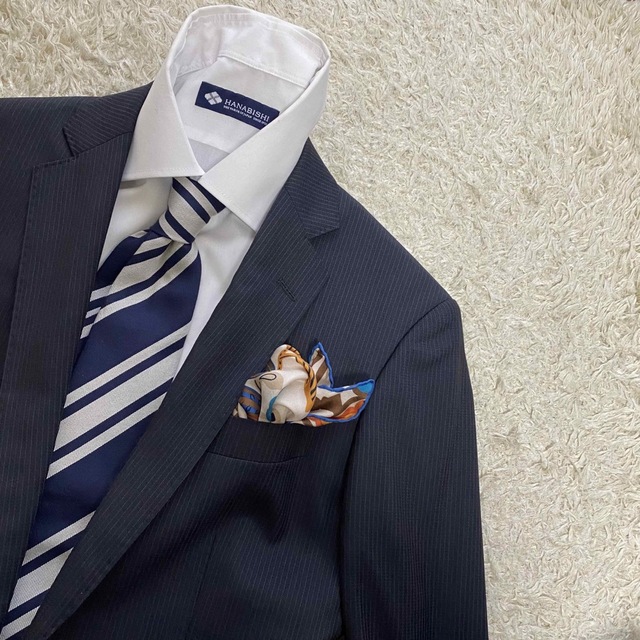 THE SUIT COMPANY(スーツカンパニー)のBlu e Grigio UNIVERSAL LANGUAGE のレーベル　S位 メンズのスーツ(セットアップ)の商品写真