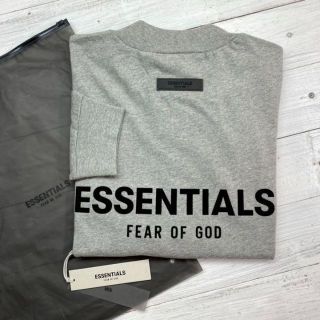 フィアオブゴッド(FEAR OF GOD)の新品【メンズM】★エッセンシャルズ★バックプリント長袖Tシャツ/グレー(Tシャツ/カットソー(七分/長袖))