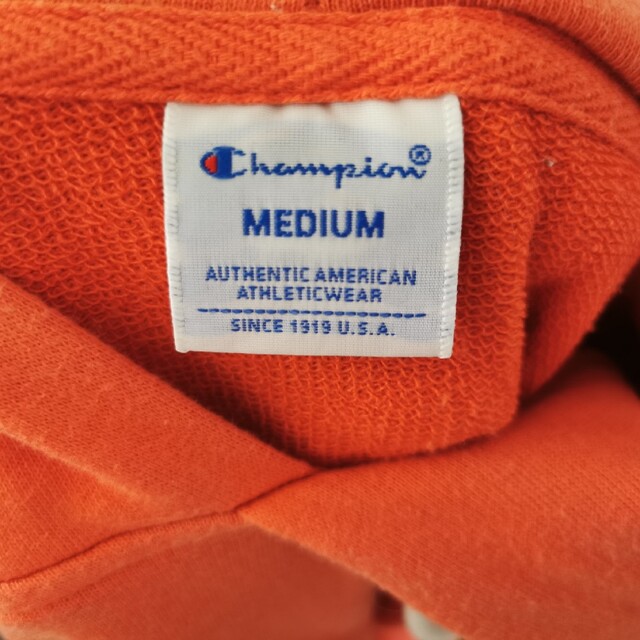 Champion(チャンピオン)の美品 Champion パーカー オレンジ M レディースのトップス(パーカー)の商品写真