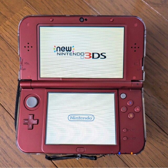 ニンテンドー3DS(ニンテンドー3DS)のNewニンテンドー3DS LL メタリックレッド microSDHC32GB付 エンタメ/ホビーのゲームソフト/ゲーム機本体(携帯用ゲーム機本体)の商品写真