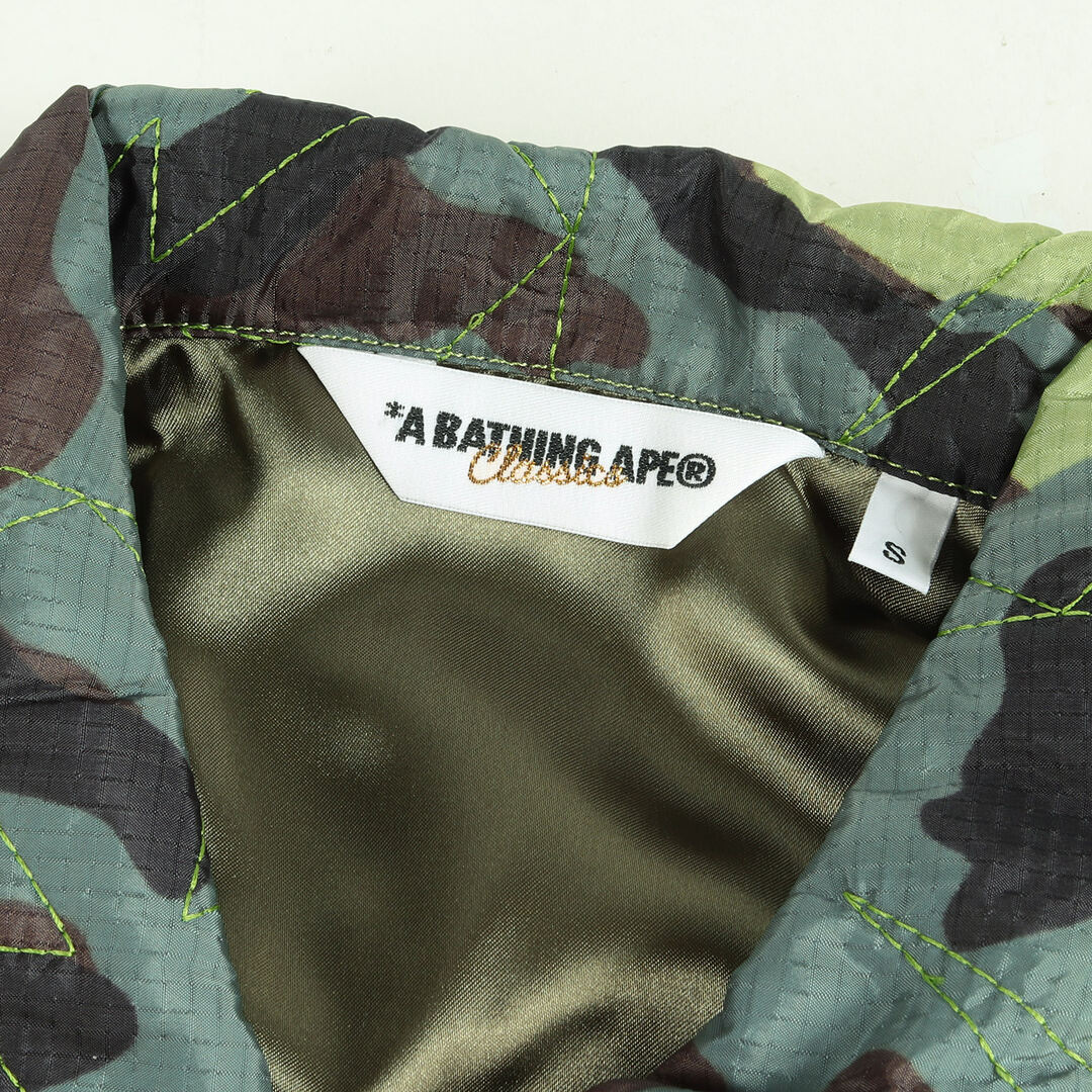 A BATHING APE(アベイシングエイプ)のA BATHING APE ア ベイシング エイプ STAキルティング 猿 迷彩 スーベニアジャケット グリーンカモ S カジュアル ストリート カモフラ アウター ブルゾン【メンズ】【K3699】 メンズのジャケット/アウター(その他)の商品写真