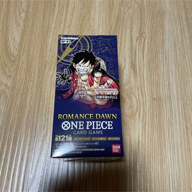 ONE PIECE(ワンピース)の新品未開封品　ワンピース カードゲーム ROMANCE DAWN 1箱　テープ付 エンタメ/ホビーのトレーディングカード(Box/デッキ/パック)の商品写真