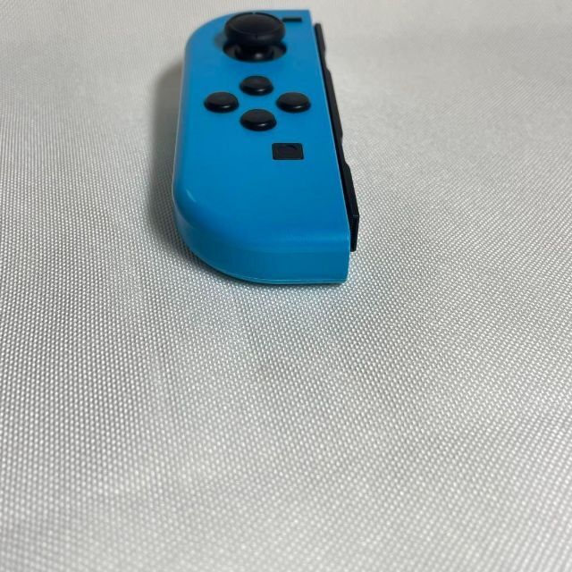 Nintendo Switch(ニンテンドースイッチ)のNintendoSwitch ジョイコン　ネオンブルー　左のみ　(L) エンタメ/ホビーのゲームソフト/ゲーム機本体(家庭用ゲーム機本体)の商品写真
