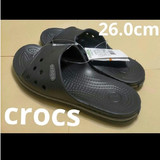 CROSS(クロス)の新品未使用クロックス   crocs   ロゴ スリップオン サンダル ブラック メンズの靴/シューズ(サンダル)の商品写真