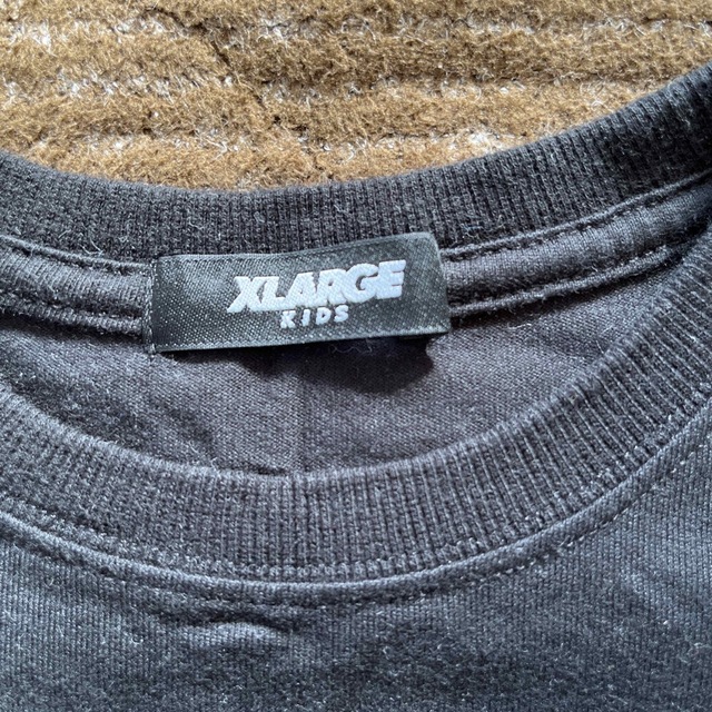 XLARGE(エクストララージ)の値下げ！XLARGE kidsの黒の半袖Tシャツ キッズ/ベビー/マタニティのキッズ服男の子用(90cm~)(Tシャツ/カットソー)の商品写真