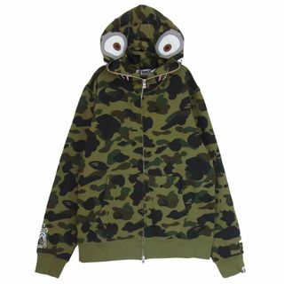 アベイシングエイプ(A BATHING APE)のA BATHING APE アベイシングエイプ 22SS 001ZPI731902C × MINIONS ミニオンズ 1ST CAMO MINIONS SHARK FULL ZIP HOODIE ファーストカモ フルジップ シャーク スウェット パーカー  カーキ系 L【中古】(パーカー)