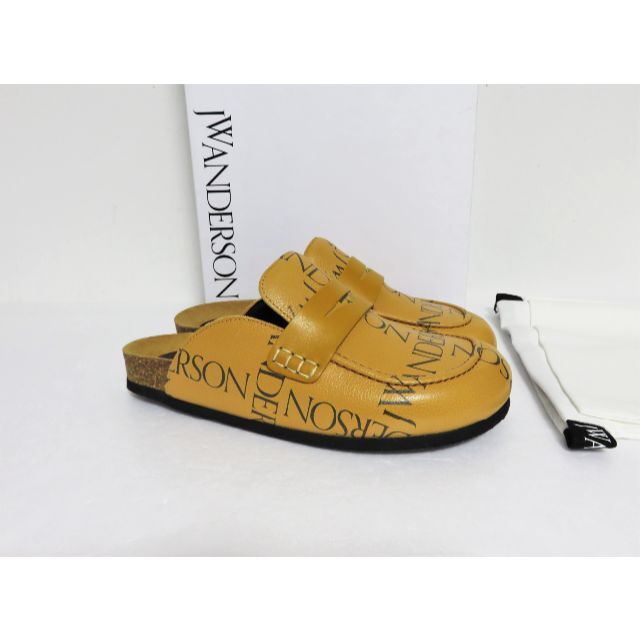 J.W.ANDERSON(ジェイダブリューアンダーソン)の定価6.8万 JW ANDERSON Logo Print Mules 38 レディースの靴/シューズ(ミュール)の商品写真