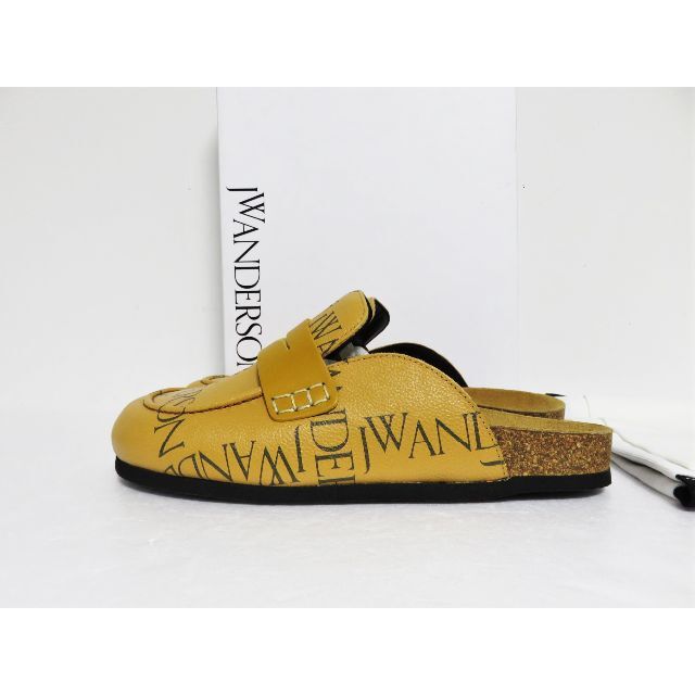 J.W.ANDERSON(ジェイダブリューアンダーソン)の定価6.8万 JW ANDERSON Logo Print Mules 38 レディースの靴/シューズ(ミュール)の商品写真