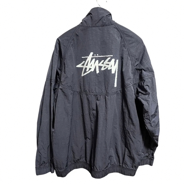 STUSSY(ステューシー)の【BTSジョングク着用】ナイキ ステューシー コラボ ハーフジップ ナイロン L メンズのジャケット/アウター(ナイロンジャケット)の商品写真