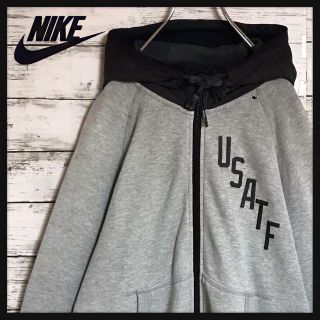 ナイキ(NIKE)の【ナイロンフード】ナイキ　袖ロゴ入りジップパーカー　グレー　C78(パーカー)