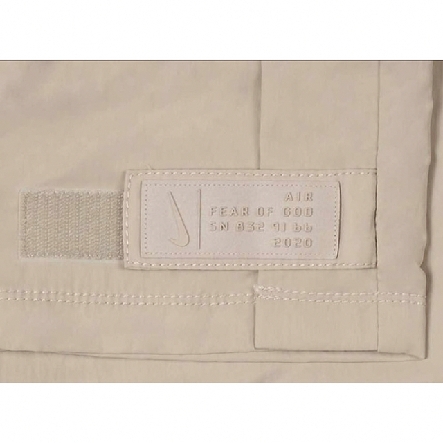 FEAR OF GOD(フィアオブゴッド)のフィア オブ ゴッド ナイキ ナイロン ウォーム アップ パンツ タン/ストリン メンズのパンツ(その他)の商品写真