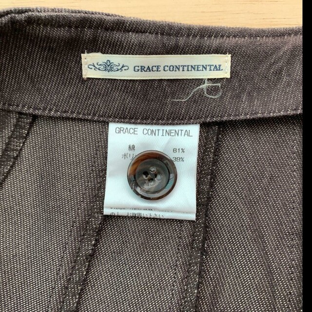 GRACE CONTINENTAL(グレースコンチネンタル)のグレースコンチネンタルアシンメトリー巻きスカート茶デニム レディースのスカート(ロングスカート)の商品写真