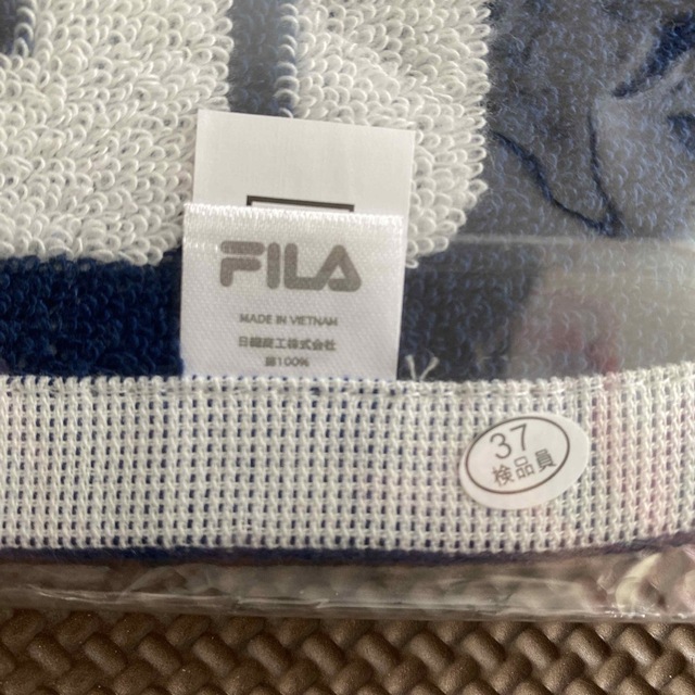 FILA(フィラ)のFILA ハンドタオル【未使用品】 インテリア/住まい/日用品の日用品/生活雑貨/旅行(タオル/バス用品)の商品写真