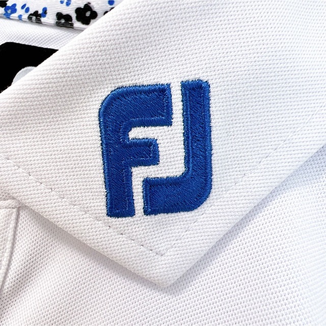 FootJoy(フットジョイ)のフットジョイ ゴルフウェア ポロシャツ ゴルフシャツ ホワイト 花柄 刺繍ロゴ スポーツ/アウトドアのゴルフ(ウエア)の商品写真