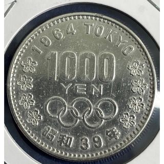 東京オリンピック1000円銀貨　コインパッケージ入り。並品(金属工芸)
