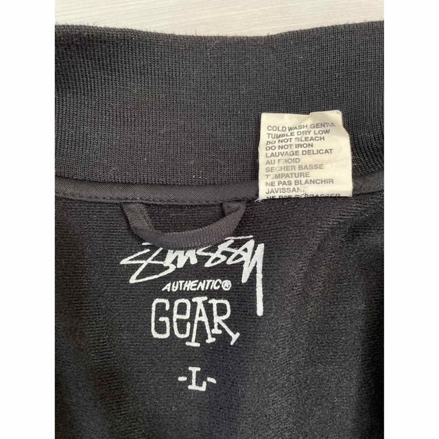 STUSSY(ステューシー)のSTUSSYステューシー　トラックジャケット2005　25周年　総柄　ブラックL メンズのジャケット/アウター(その他)の商品写真