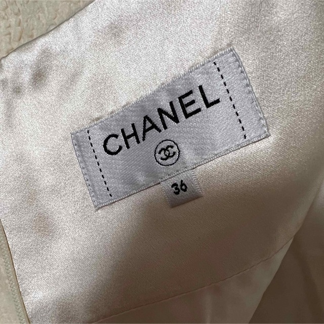 CHANEL(シャネル)のCHANEL シャネル スカート オフホワイト 美品 レディースのスカート(ひざ丈スカート)の商品写真