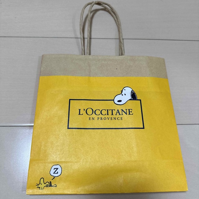 SNOOPY(スヌーピー)の【紙袋】L’OCCITANE スヌーピー　コラボ レディースのバッグ(ショップ袋)の商品写真