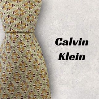 カルバンクライン(Calvin Klein)の【4985】良品！Calvin Klein ネクタイ　カーキ・ブラウン系(ネクタイ)