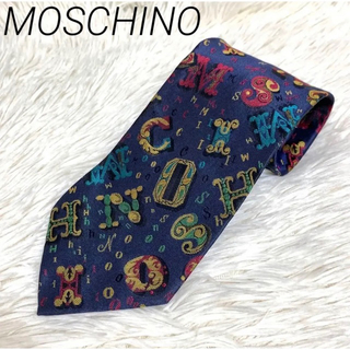モスキーノ(MOSCHINO)の【美品】MOSCHINO ロゴ 総柄 シルク ネクタイ アート系 良デザイン(ネクタイ)