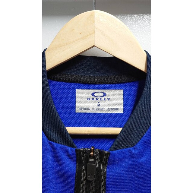 Oakley(オークリー)のOAKLEY リブ襟 ポリエステル ジャージ フィットネス ジャケット ブルー メンズのトップス(ジャージ)の商品写真