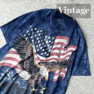 アートヴィンテージ(ART VINTAGE)の【vintage】USA製 星条旗 鷲 プリント タイダイ ルーズ Tシャツ 青(Tシャツ/カットソー(半袖/袖なし))