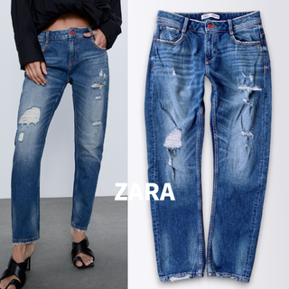 ザラ(ZARA)のザラ　ストレッチテーパードデニム　ダメージ加工ジーンズ　レッドボタン　EU34(デニム/ジーンズ)