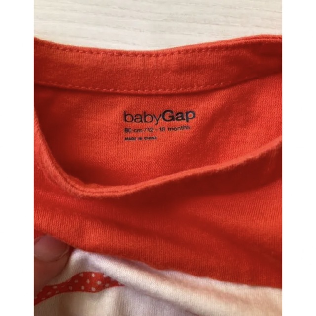 babyGAP(ベビーギャップ)のbabygap 80 オレンジボーダー　半袖ロンパース キッズ/ベビー/マタニティのベビー服(~85cm)(ロンパース)の商品写真