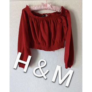 エイチアンドエム(H&M)のエイチ・アンド・エム　丈短め　H＆M　赤　ダンス　裾に元々のほつれあり(カットソー(長袖/七分))