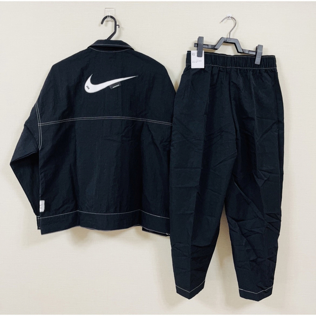 NIKE(ナイキ)のナイキ　NSW スウッシュ ウーブン ジャケット パンツ セットアップ　S レディースのジャケット/アウター(ナイロンジャケット)の商品写真